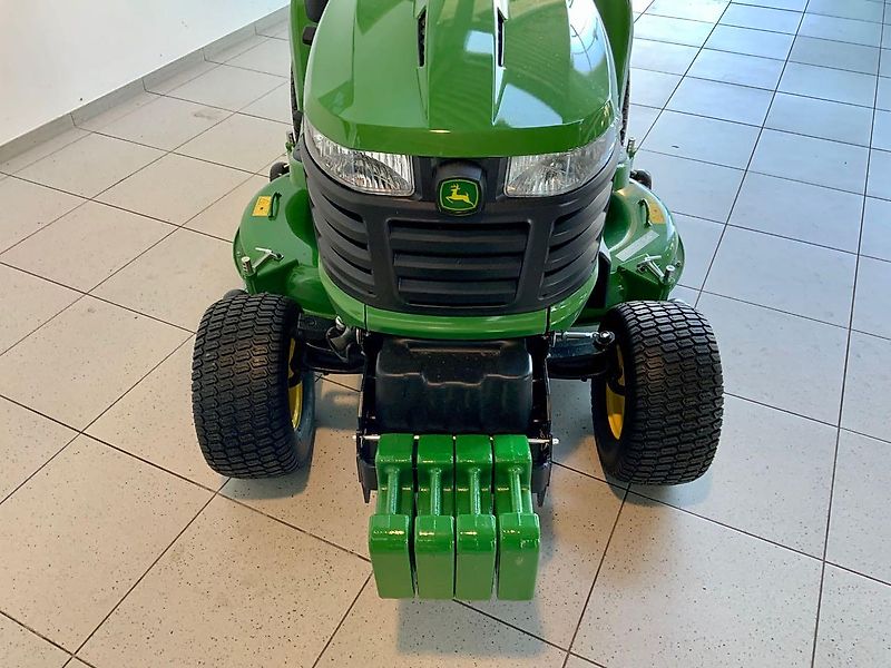 John Deere X950R - Hochentleerung